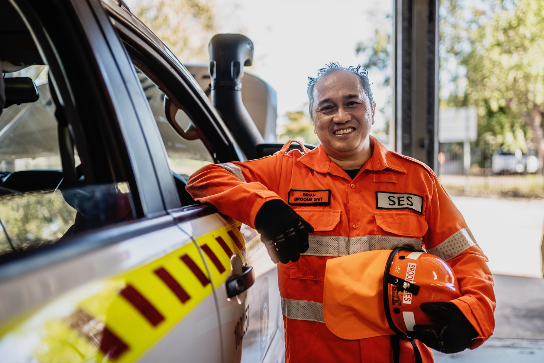 Broome SES volunteer standing beside an emergency response vehicle